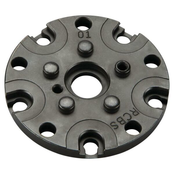 Metal circular disc with grooves and holes.