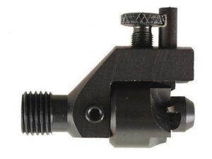 Machined metal component with screw and bolt attachments.