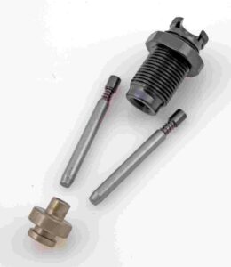 Three metal automotive parts on white background.