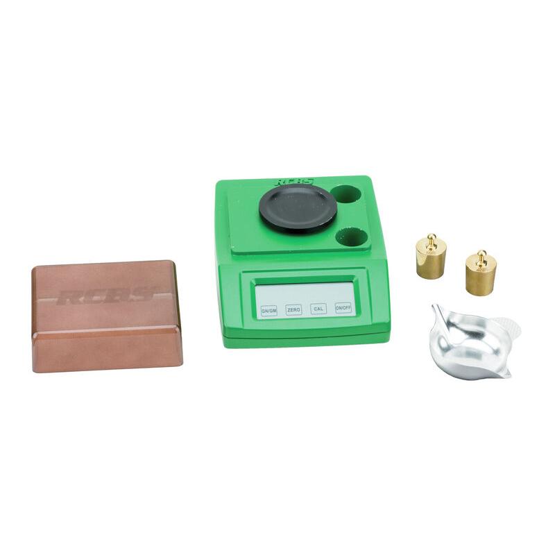 Green RCBS scale with weights and accessories.