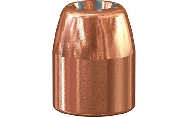 Copper bullet close-up, shiny and textured surface.