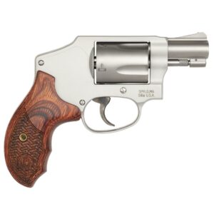 Silver revolver with wooden grip, side view