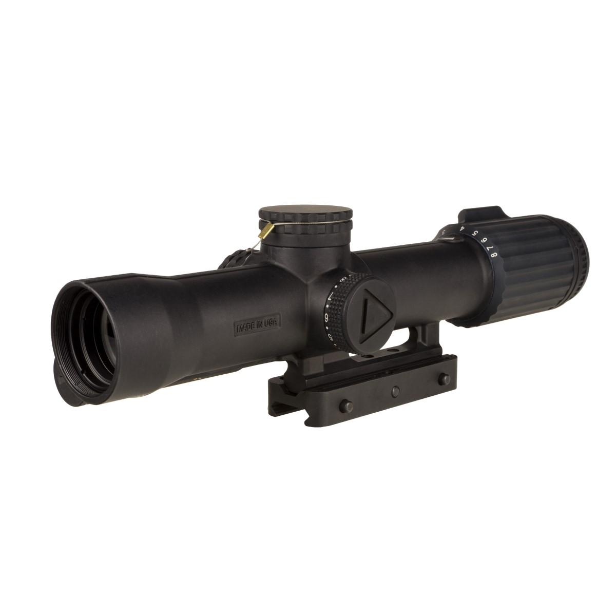 Black rifle scope with adjustment knobs.