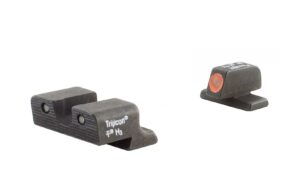 Trijicon handgun night sights on white background