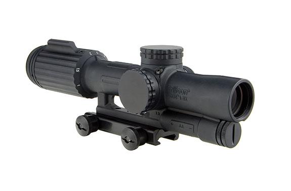 Rifle scope with adjustable magnification and mounting bracket.