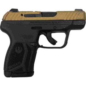 Compact black and gold handgun, side view.