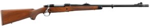 Wooden bolt-action hunting rifle with black barrel.