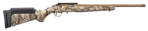 Camouflage hunting rifle with scope mount.