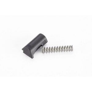 Black plastic part and metal coil spring