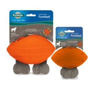 PetSafe orange treat-dispensing football dog toy.