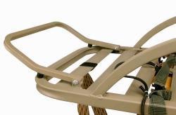 Tan metal frame with handrails and straps.