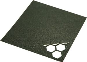 Textured grip tape with hexagonal cutouts