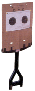 Cardboard gun target on stand for shooting practice.