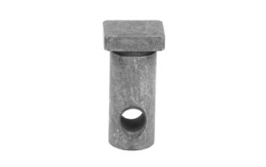 Grey cylindrical stone sculpture with square top