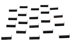 Multiple small black coil springs arranged in rows.