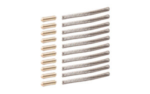 Metal pins and springs set on white background.