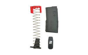 Gun magazine components disassembled on white background.