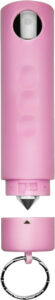 Pink pepper spray keychain for personal safety.