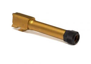 Gold gun barrel with black muzzle brake