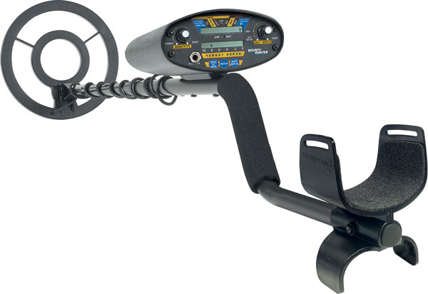 Metal detector with digital display and coil