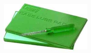 Green dental tool with plastic storage case.
