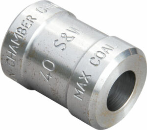 Metallic cylinder with engraved text, side view