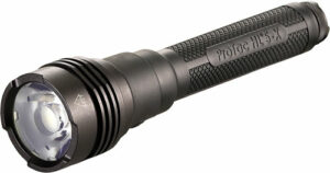 Black tactical flashlight with textured grip and lens.