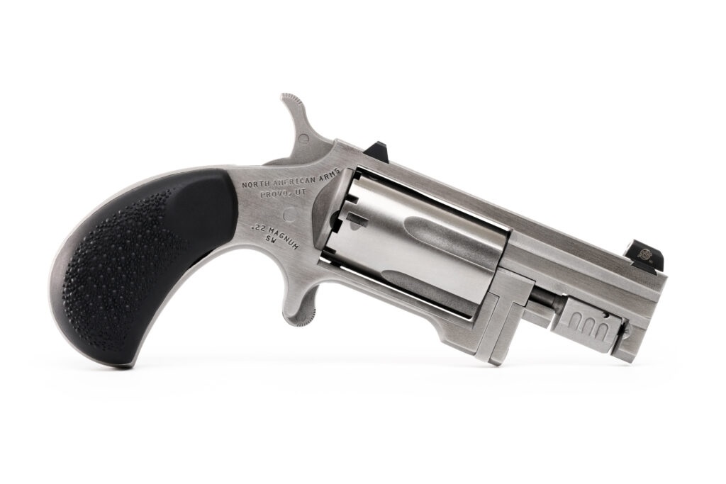 Silver revolver with black grip on white background.