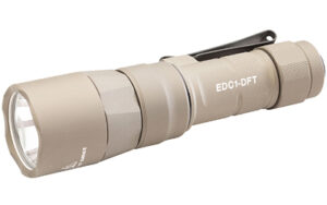 Tan tactical flashlight with clip.