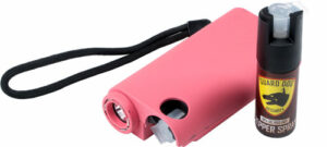 Pink taser with black strap, pepper spray beside