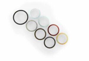 Assorted colorful metal rings on white background.