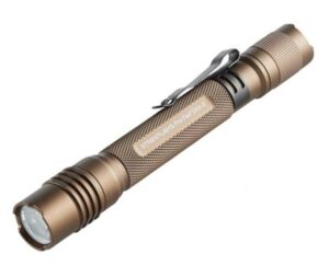 Bronze tactical flashlight with clip and textured grip.