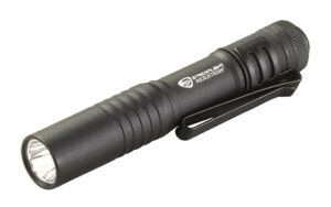 Black tactical flashlight with clip attachment
