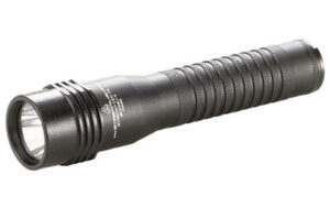 Black tactical flashlight with textured grip