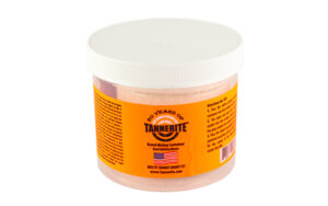 Tannerite container with orange label and white lid.