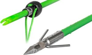 Green archery arrow with broadhead tip