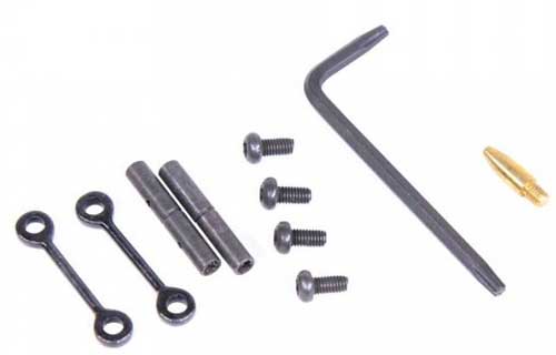 Various metal tools and screws on white background.