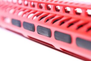 Close-up of red ergonomically designed handrail