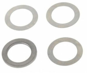 Four metal washers on white background
