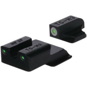 Tritium night sights for firearms with green dots.