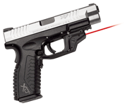 Handgun with laser sight, right side view.