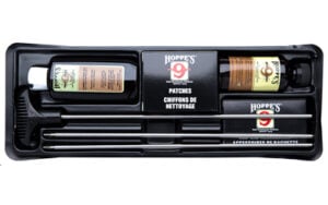 Gun cleaning kit with rods and solutions.