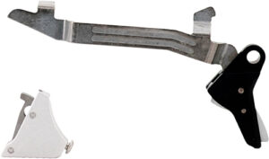 Gun trigger mechanism parts on white background