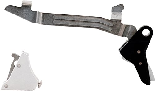 Gun trigger mechanism parts on white background