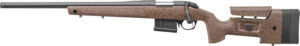 Bolt-action rifle with textured stock and scope mount.