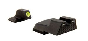 Black firearm night sights with luminous dots