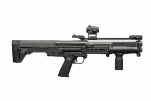 Black tactical shotgun with optic sight attachment.