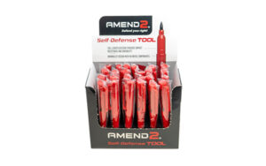 Display of Amend2 self-defense pens in red packaging.