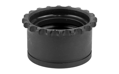 Black metal automotive part with gear-like edges.