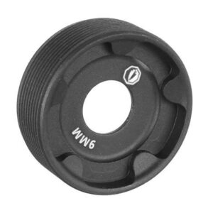 Black plastic gear with central hole and grooves.